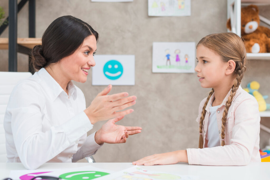 This is an image of a speech therapist giving guidance on child development