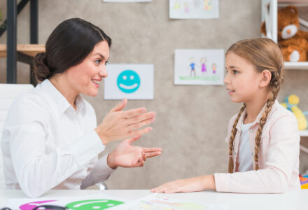 This is an image of a speech therapist giving guidance on child development