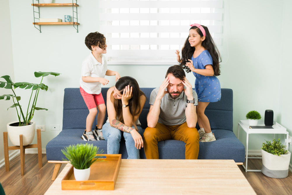 This is an image of a stressed couple of children suffering from ADHD during child development.